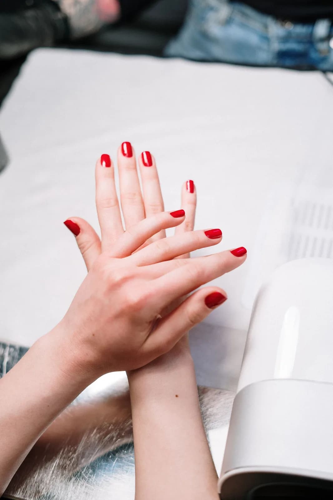 Manicure with red nail polish
