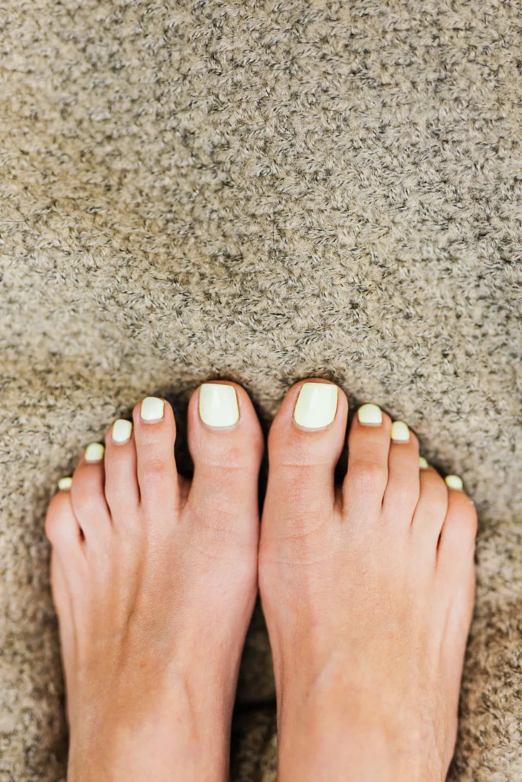 Pedicure with white nail polish